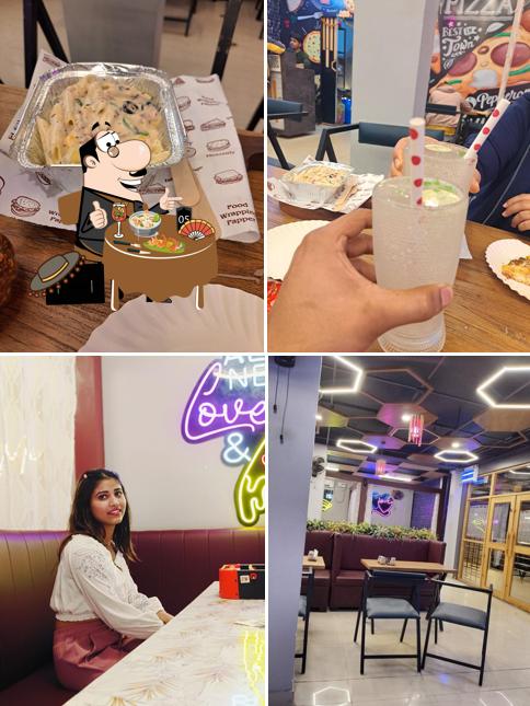 The photo of food and interior at Pizzeria Bistro Modipuram