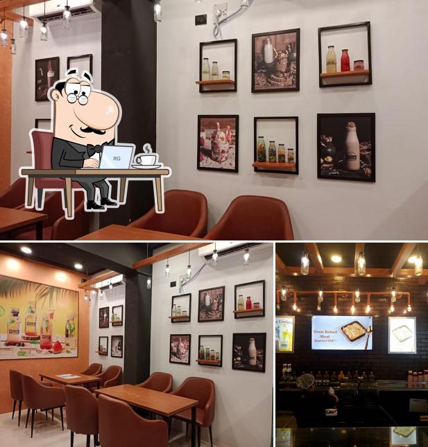 Take a seat at one of the tables at Frozen Bottle - Milkshakes, Desserts, and Ice Cream