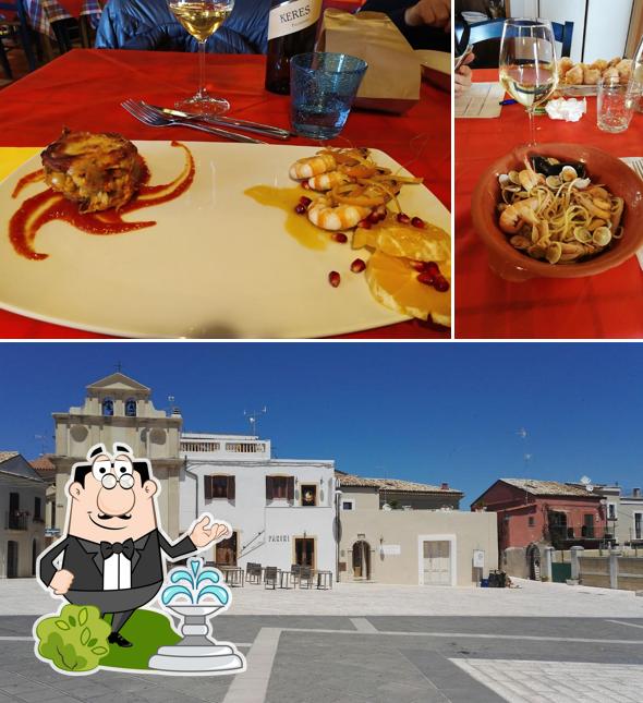 Curiosa tra la parte esterna di Ristorante Osteria Dentro Le Mura