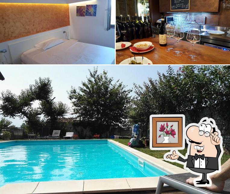 Questa è la immagine che mostra la interni e vino di Hotel Antico Borgo Torricella & Wellness