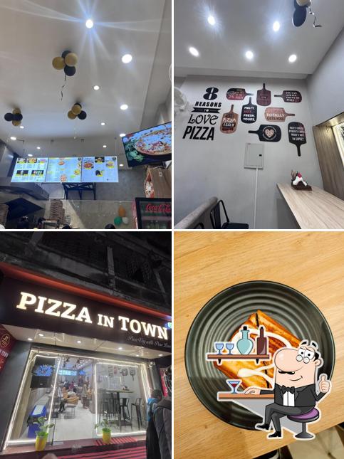 The interior of PIZZA IN TOWN