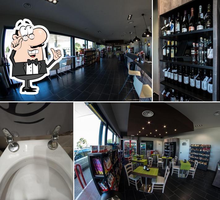 Siediti a un tavolo di Stazione di servizio Eni sud