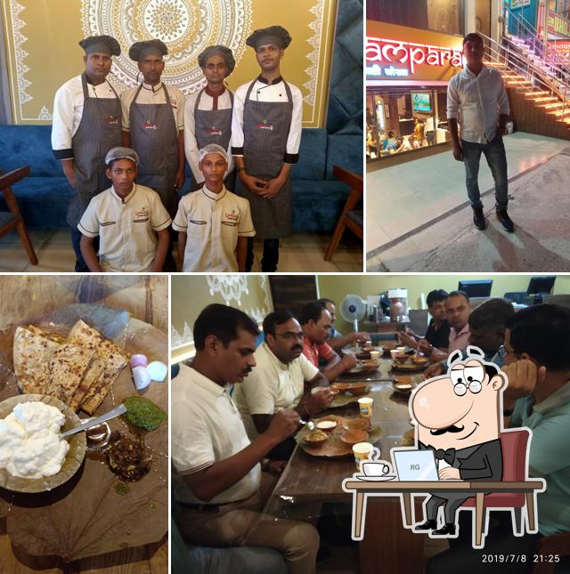 Take a seat at one of the tables at Parampara Baati Chokha