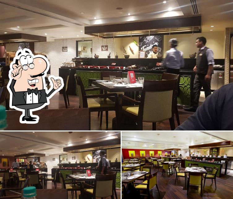 Take a seat at one of the tables at Garden Grille & Bar