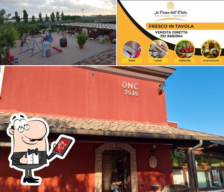 Puoi goderti l'aria fresca da seduto all'esterno di Agriturismo La piana dell'Erika