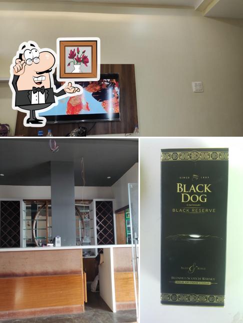 Take a seat at one of the tables at Jay Mahakali