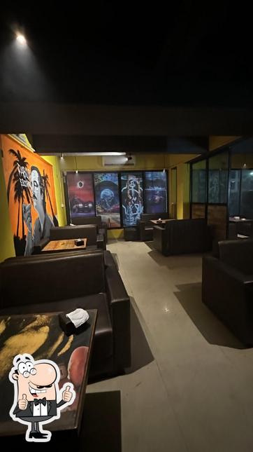 Look at this image of The lions den
