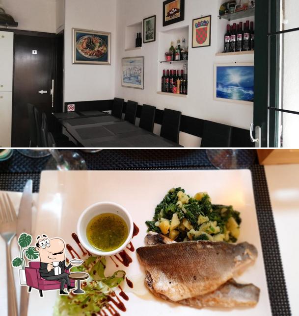 Siediti a un tavolo di Konoba Sciabecco