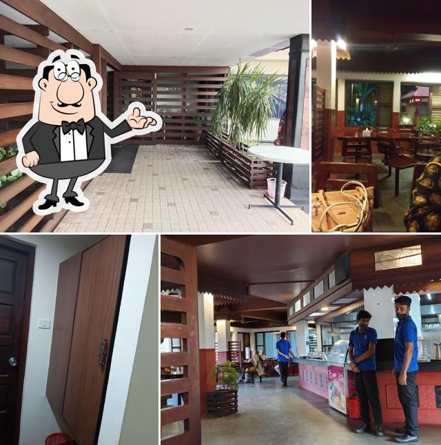 Take a seat at one of the tables at BTH Bharat Hotel