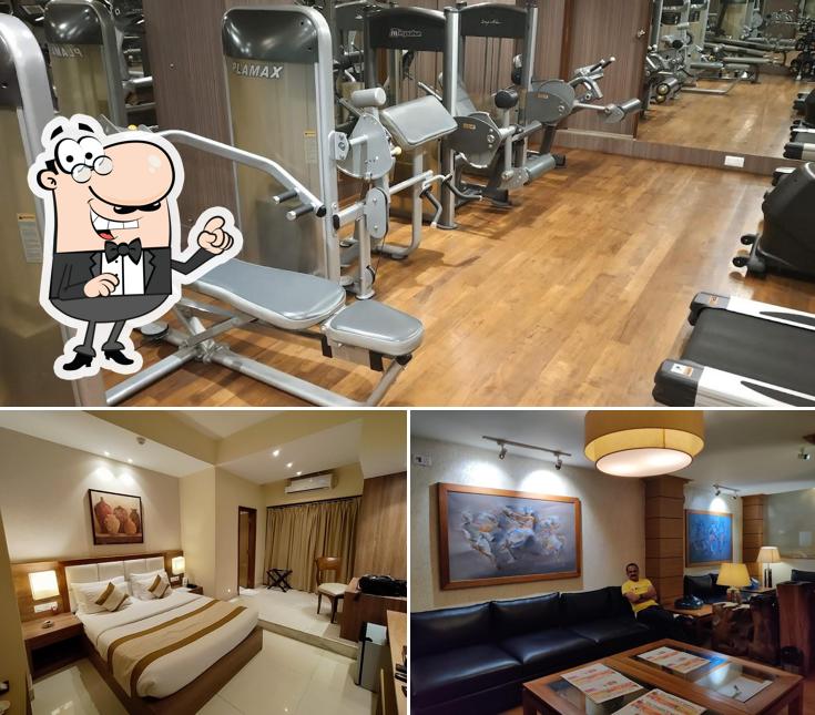 Take a seat at one of the tables at SANGAI CONTINENTAL (The Boutique Hotel)