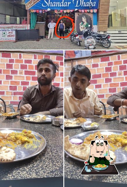 Among different things one can find food and exterior at Shandar Dhaba