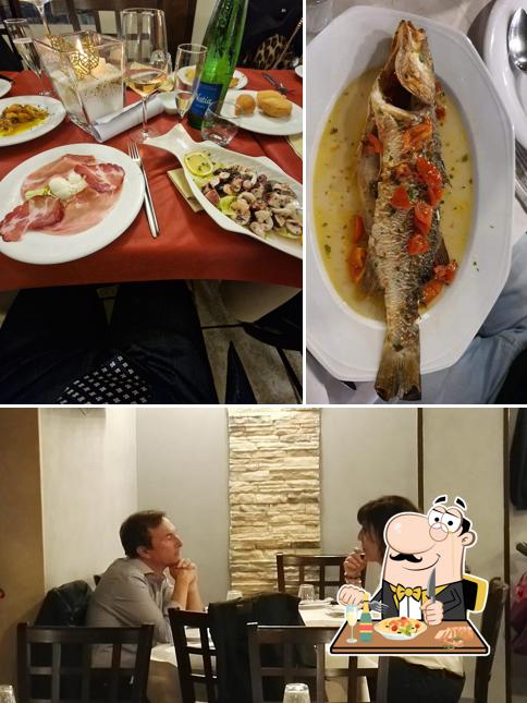 Carpe Diem si caratterizza per la cibo e interni