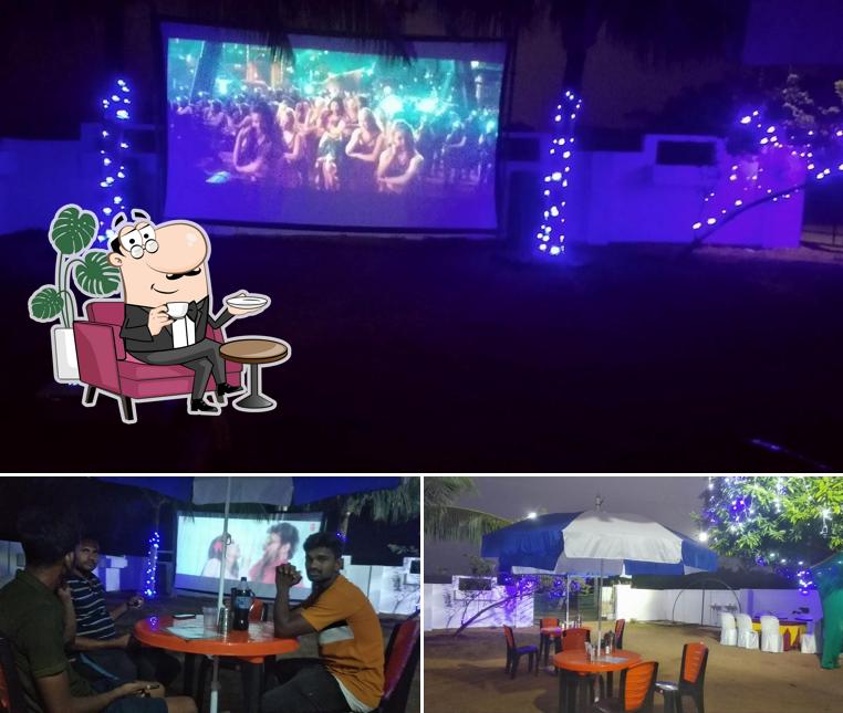 Take a seat at one of the tables at VK GARDENS DHABA