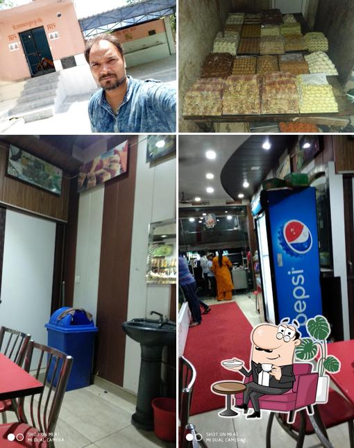 Take a seat at one of the tables at Bikaner Sweets
