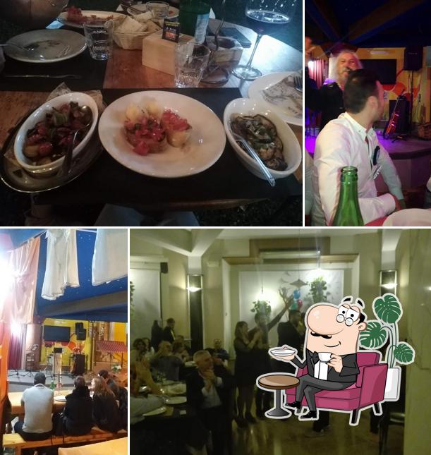Dai un'occhiata agli interni di Taverna a’ tammurriata