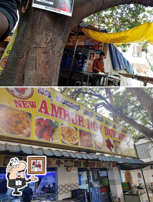 Take a seat at one of the tables at New Ambur Hot Dum Biryani