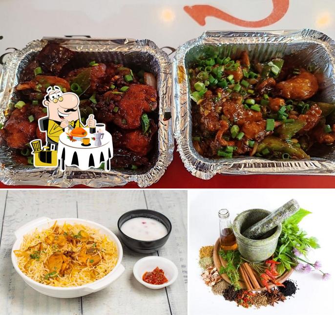 The photo of food and beer at Biryani Cottage