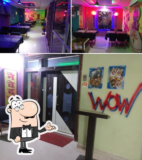 Take a seat at one of the tables at NAIVEDYAM