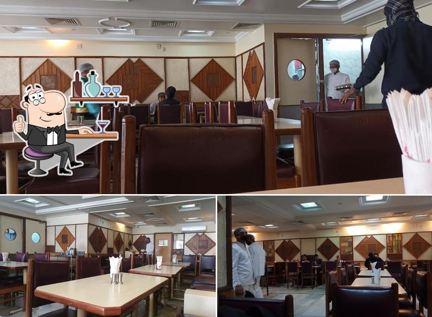 Take a seat at one of the tables at Bansi Vihar Restaurant