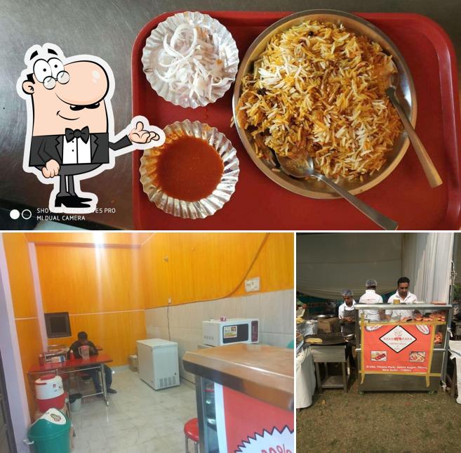 This is the picture showing interior and food at KHAN BABA Restaurant (chicken kathi roll &special fish roll first tym in okhla)