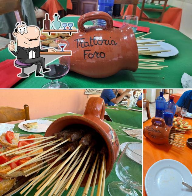 Dai un’occhiata alla immagine che presenta la interni e bevanda di Trattoria Foro Arrosticini