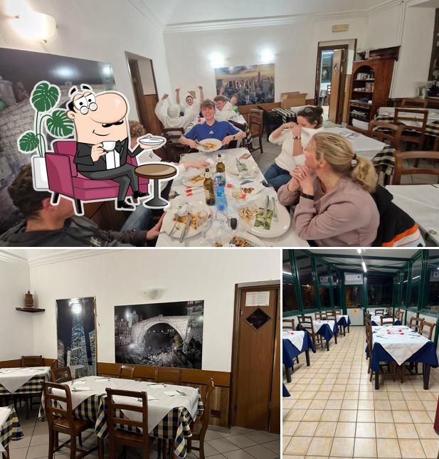 Dai un'occhiata agli interni di Trattoria pizzeria new york