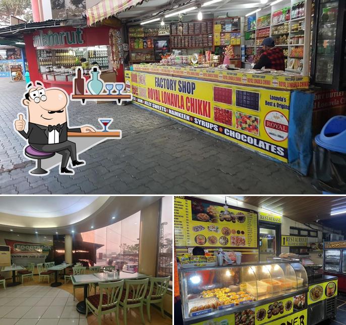 Take a seat at one of the tables at Bhairavi's Restaurant & Food court