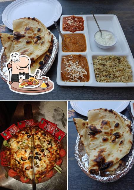 Pick pizza at Aapni Haveli Restaurant