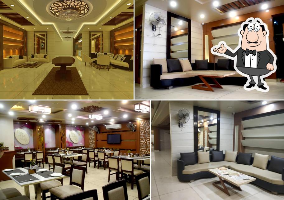 Take a seat at one of the tables at Sunrise Hotel