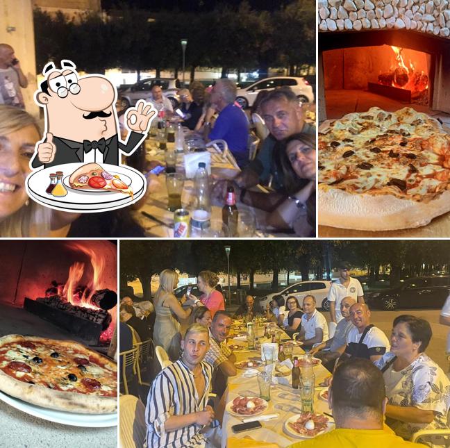 Prenditi una pizza a L'Élite del Gusto