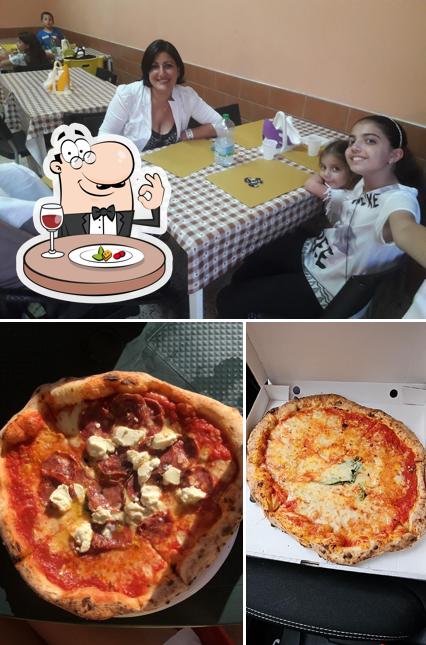 Questa è la immagine che raffigura la cibo e interni di Pizzeria Le Querce di Mamre