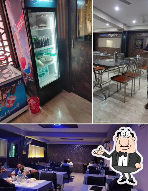 Take a seat at one of the tables at Hotel Elite