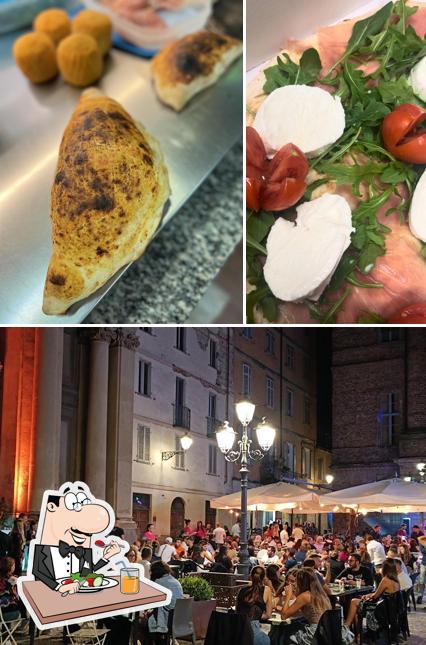 Tra le diverse cose da Pizzò Via Roma si possono trovare la cibo e interni