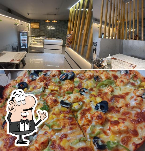 The picture of interior and pizza at Cafe Shine