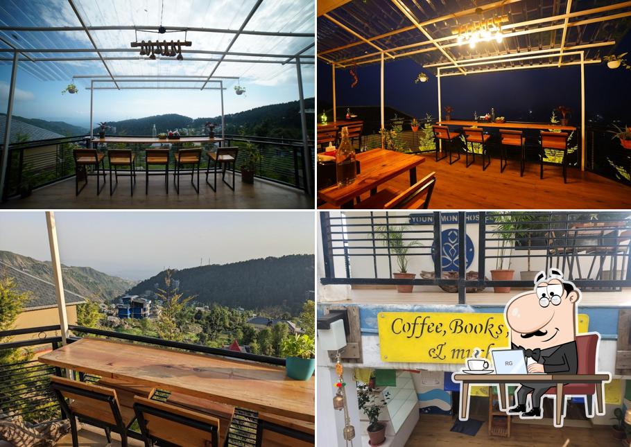 Take a seat at one of the tables at Young Monk Cafe Dharamkot