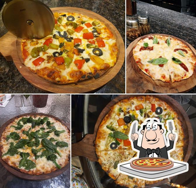 Get pizza at Cafe Oj