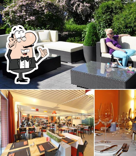 Dai un’occhiata alla foto che raffigura la interni e vino di Restaurant AMBIENTE
