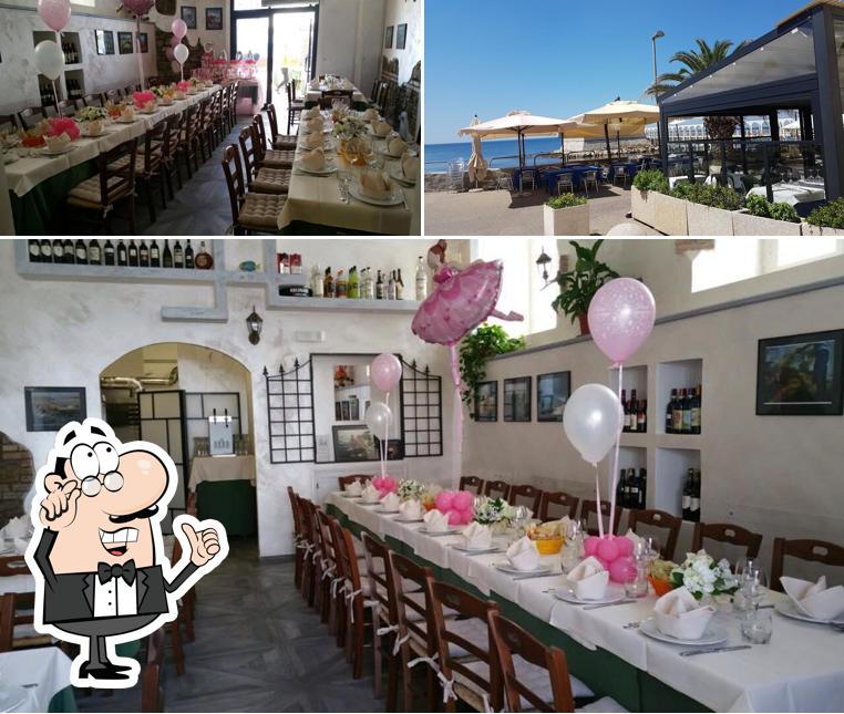 Questa è la immagine che presenta la interni e esterno di Ristorante Il Delfino