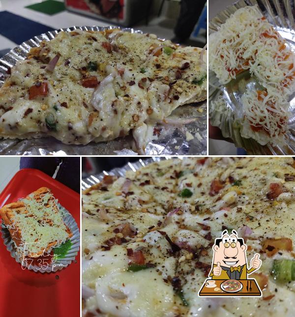 Get pizza at RD's Bombay Sandwich Center