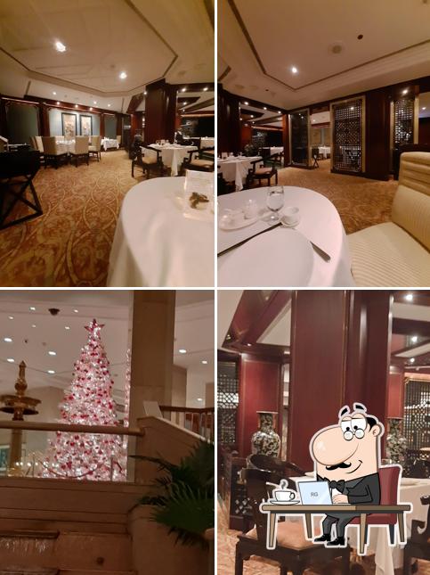 Take a seat at one of the tables at The Great Wall - Chinese Speciality Restaurant