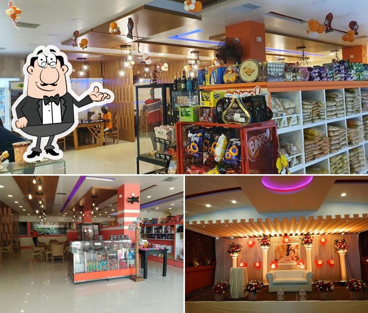 Take a seat at one of the tables at De Cake World Kattanam