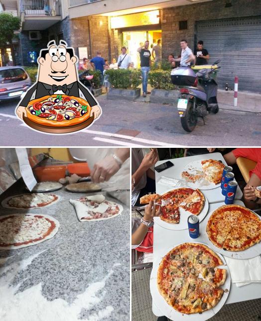 Prenditi una pizza a Pizz Stop Pizzeria da asporto