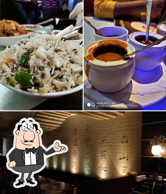 Take a seat at one of the tables at Silver Streak sahid nagar