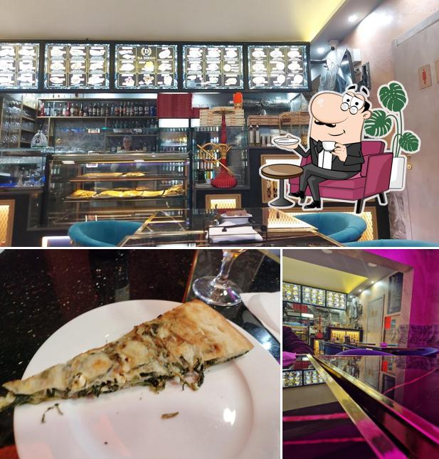 Guarda la foto che mostra la interni e pizza di DA DIEGO 5