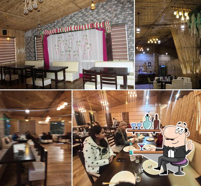 Take a seat at one of the tables at Duggar Haveli