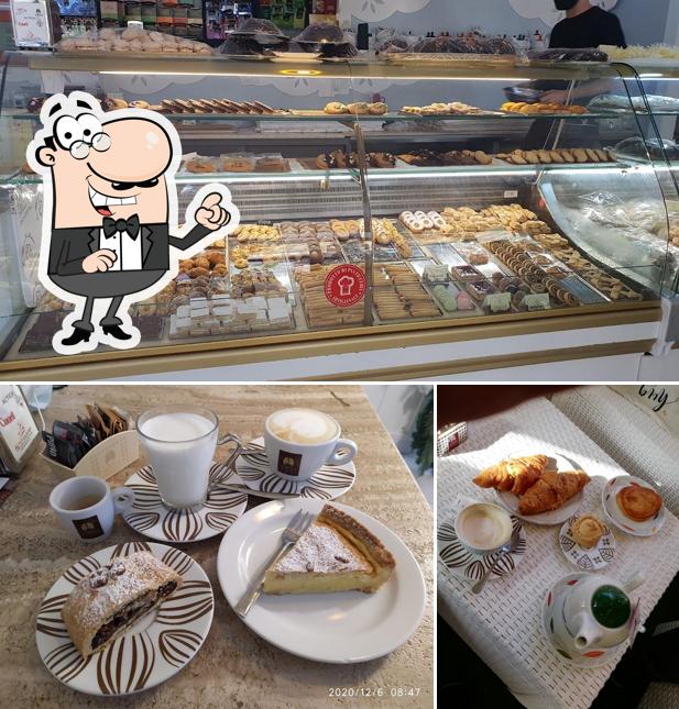 Dai un'occhiata agli interni di Pasticceria La Maison Des Delices