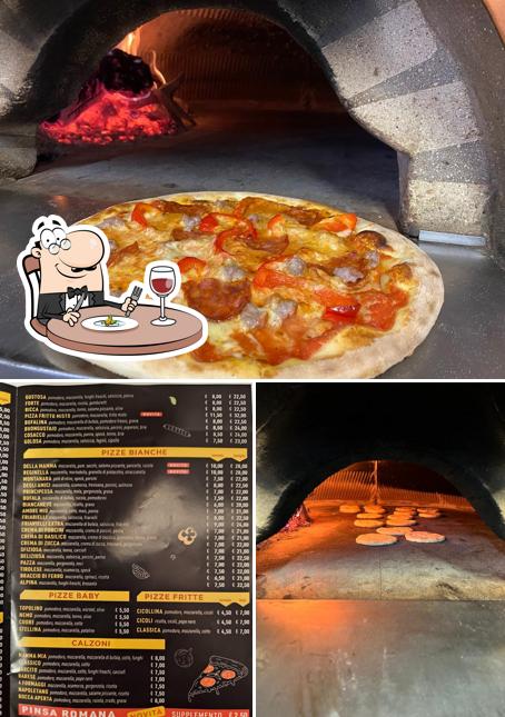 La foto di cibo e interni da Pizzeria Mamma Mia