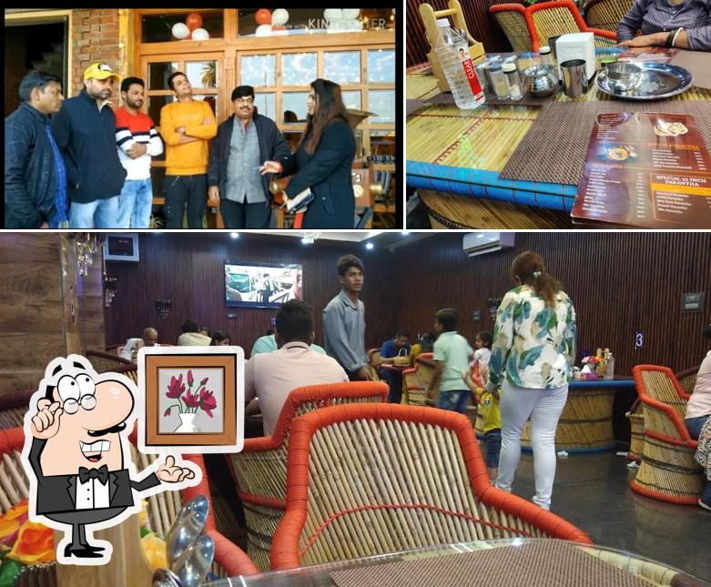 Among various things one can find interior and food at Dharam Garam