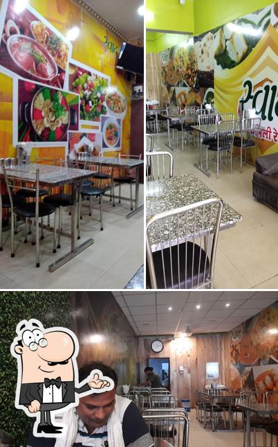 Take a seat at one of the tables at Swad Family Restaurant