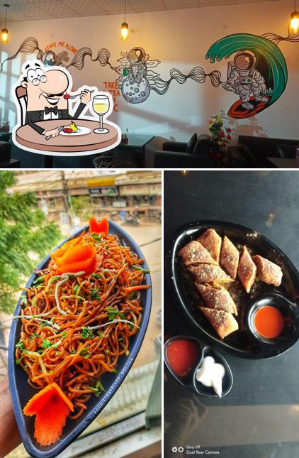 Check out the image showing food and interior at Dream Café